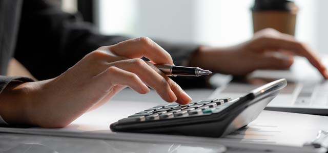 Close-up of a calculator in use